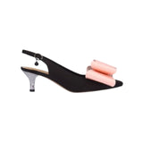 Black high-heeled shoe with pink bow