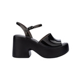 Black platform heels with black strap & buckle closure
