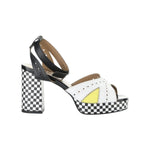 High-heeled platform shoe with checkered heel and yellow/white toe strap