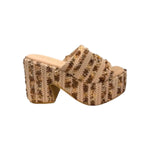 Textured brown high-heeled shoe