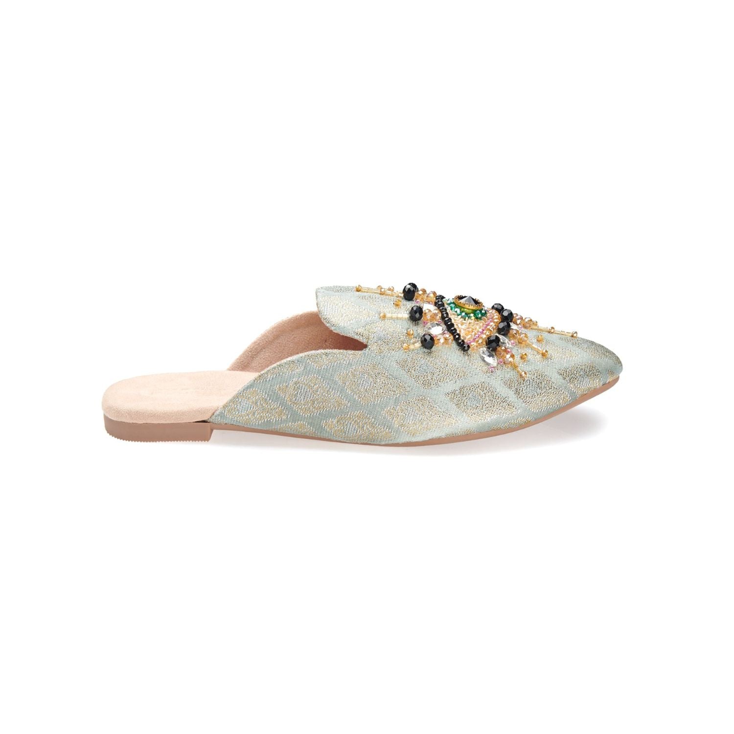 neutral colored slide mule with eye beaded embroidery detail