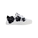 A white Karl Lagerfeld Georgia sneaker with black floral ornament details on the side 