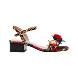 low heel sandal with buckle strap. Animal print and multicolor floral design with 3D floral applique. Betsey Johnson
