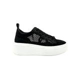 Black mesh sneaker with a white sole 