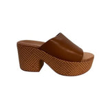 Brown platform sandal with woven sole 