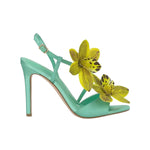 Mint green high-heeled heel with yellow floral decorations 
