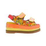 handmade platform sandal in vibrant orange, yellow, and red with adjustable straps