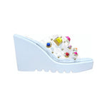 white platform wedge slip on sandal with multi-colored jewel detail