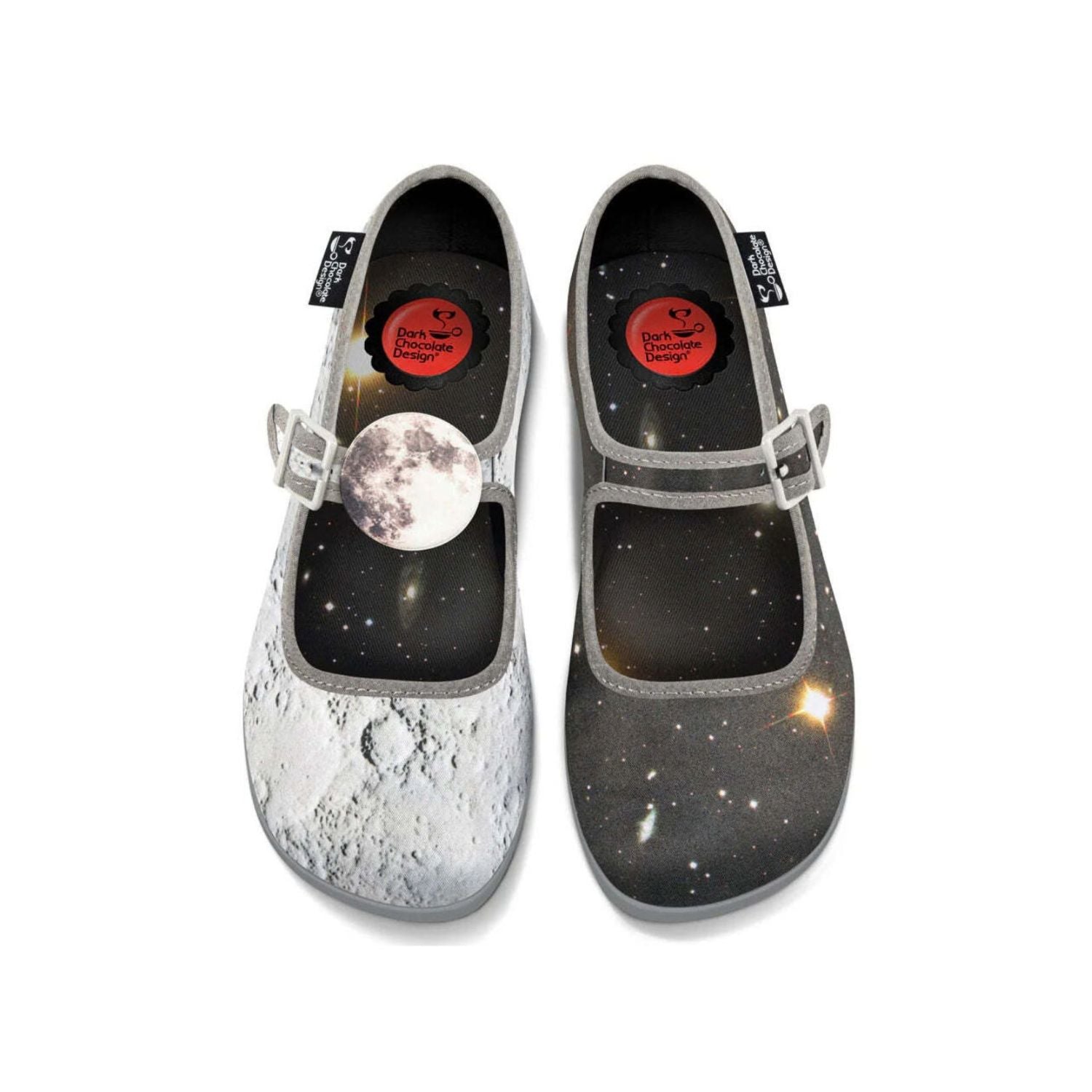 A pair of women's slip-on nocturnal-patterned slippers with a moon and stars design on a black background, featuring a non-marking rubber sole 