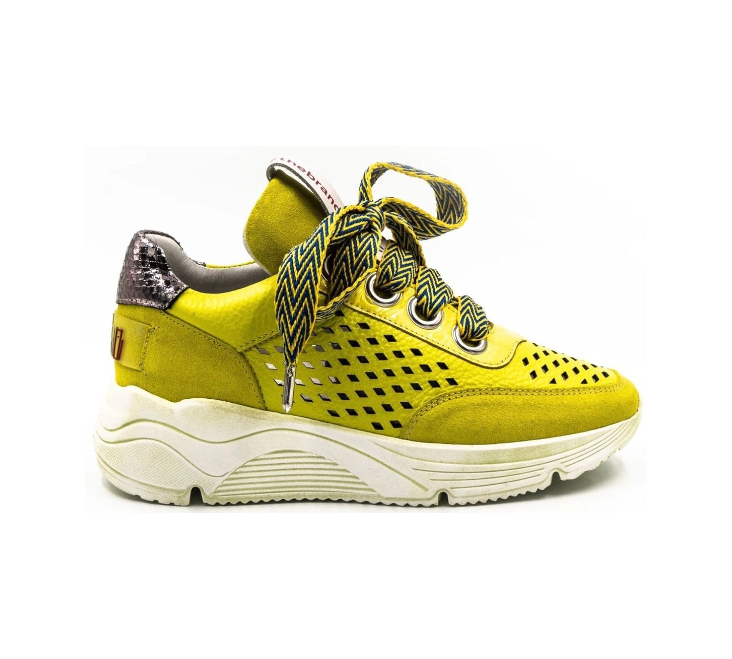 neon colored perforated platform sneaker with metallic back detail and patterned laces