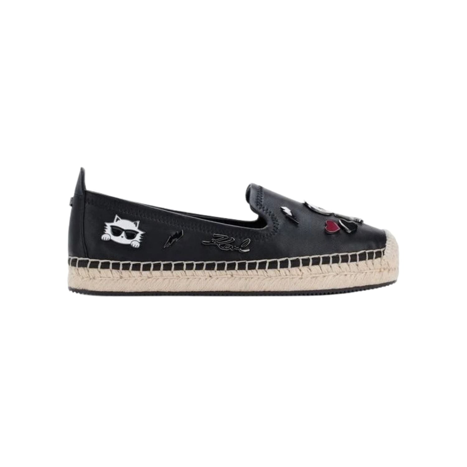 Black flat moccasin-styled shoe with decorative elements 