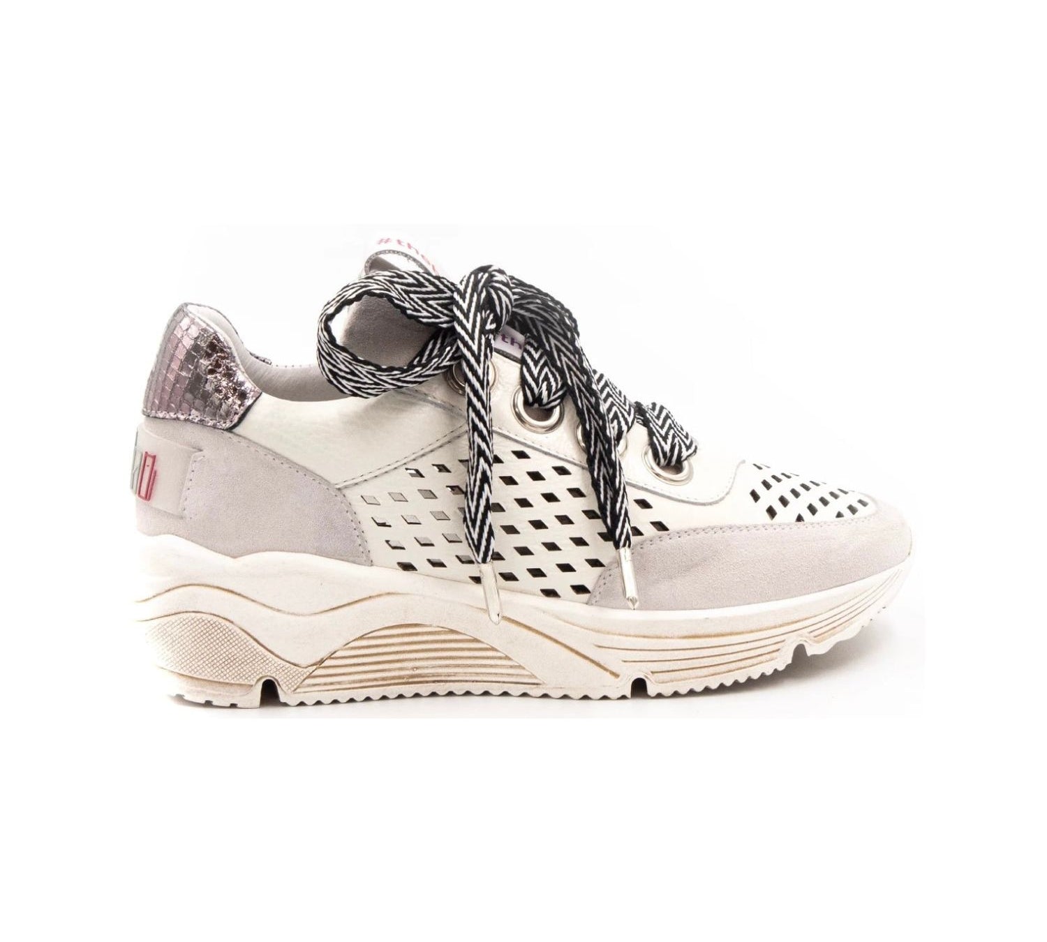 neutral colored perforated platform sneaker with metallic detail backing and patterned laces 