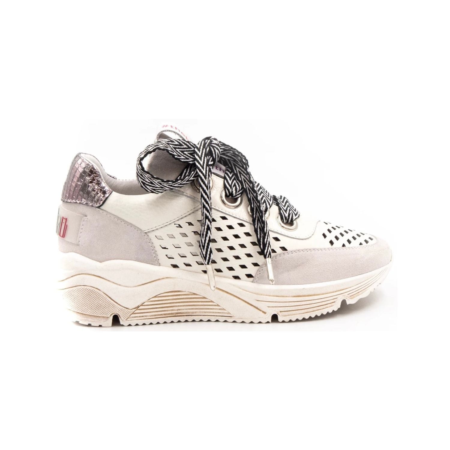 neutral colored perforated platform sneaker with metallic detail backing and patterned laces 
