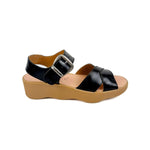 Black sandal with a brown sole 