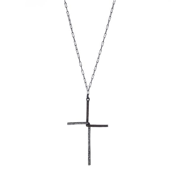 cross pendant necklace features an interlocking half metal half crystal cross. Made with an antique brass finish and black diamond crystal accents on a 16" chain. Handmade in New York.