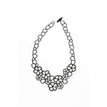 Sweet Flowers necklace by Batucada features delicate and intricate flowers. Hand crafted from materials that are 100% recyclable. This is made from vegetable based products and certified sustainable polymers. Silicone-free, latex-free, nickel-free.