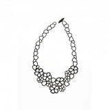 Sweet Flowers necklace by Batucada features delicate and intricate flowers. Hand crafted from materials that are 100% recyclable. This is made from vegetable based products and certified sustainable polymers. Silicone-free, latex-free, nickel-free.